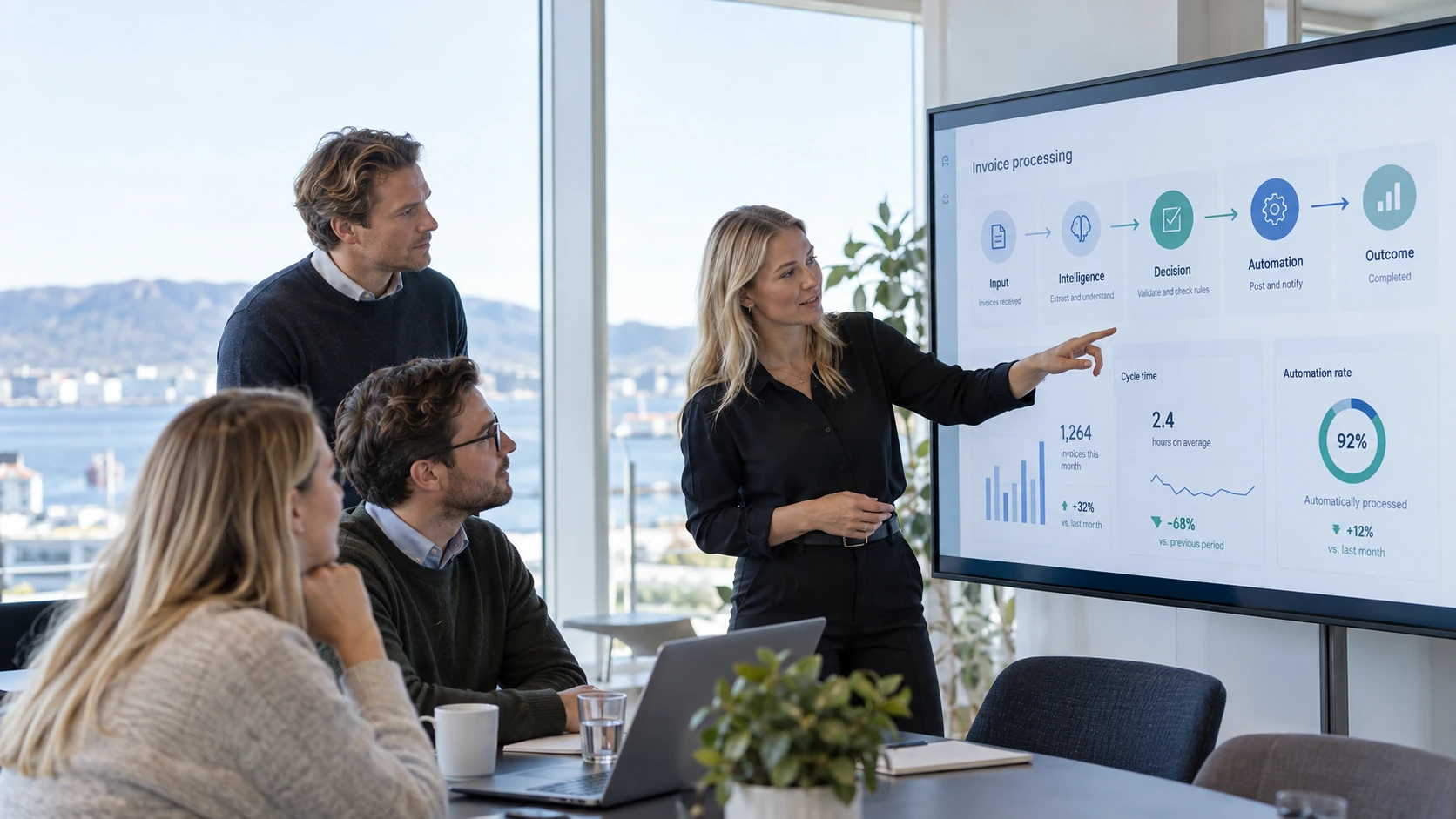 Technical specialists reviewing information together on a computer